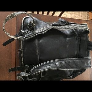 Vintage black leather knapsack